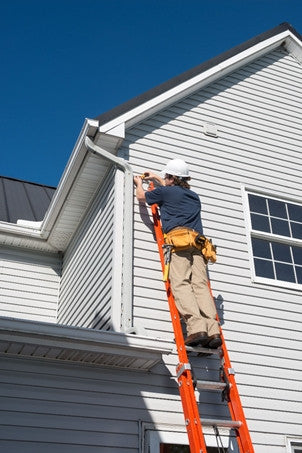 Fiberglass Extension Ladder by Louisville Type IA - In use